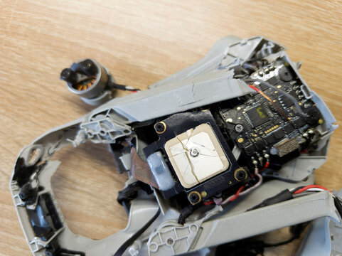 Fallen damaged quadcopter drone crash