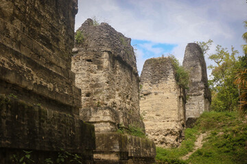 Explore the ancient ruins of Tikal in Guatemala, a stunning archaeological site reflecting Mayan history and culture amidst lush greenery