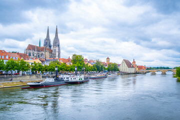 Regensburg, Germany - The picturesque skyline including the stone bridge over the Danube River, Saint Peter's Church