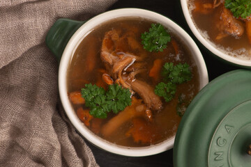 Soup with chanterelle mushrooms close up