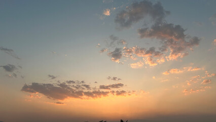 romantic colorful cloudy sky at sunset and twilight sky