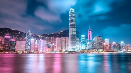 Naklejka premium Dazzling Hong Kong Skyline Lit Up in Vivid Colors for Breast Cancer Awareness