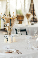Detail of a wedding dinner setting, summer event © vladdeep
