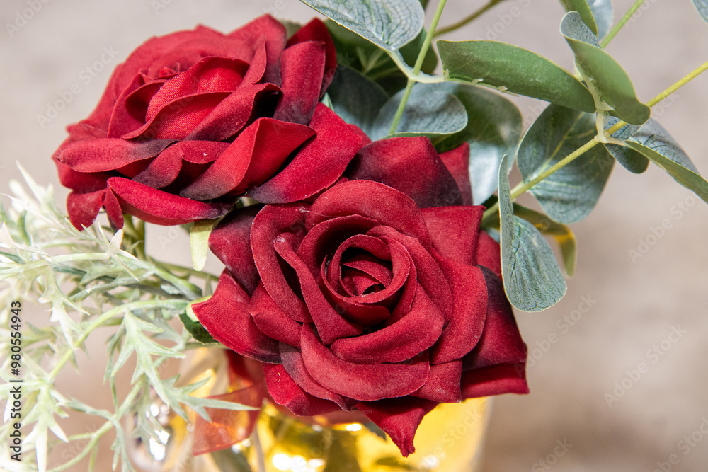 Wall mural a close up photo of a silk rose valentines day love concept