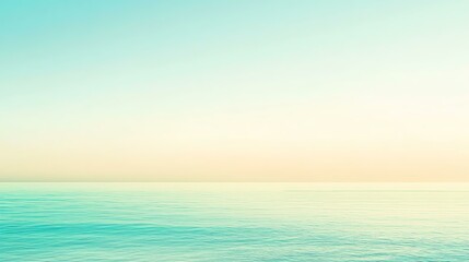 Obraz premium Serene ocean view at sunset with calming pastel colors reflecting on the water, creating a tranquil and peaceful atmosphere.