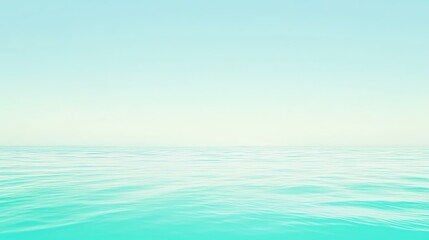 Obraz premium A serene seascape with calm waters reflecting a clear blue sky, perfect for evoking tranquility and relaxation.