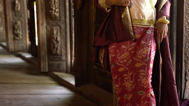 Myanmar Woman in traditional Myanmar suit sightseeing travel at ancient temple in Myanmar 