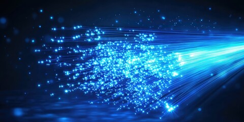 Obraz premium Abstract blue light beams with sparkling particles.