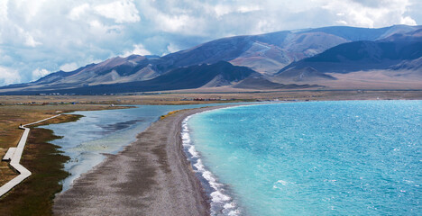 Fototapeta premium Aerial photography of the famous Sayram Lake and grassland pastures in Xinjiang, China