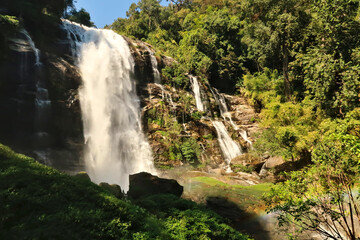 View onto the Wachirathan Waterfall, Wachirathan Falls with a small rainbow in the foreground, Mae Hong Son Loop, Doi Inthanon National Park, Thailand