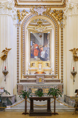 Bolsena, Italy. Altar and painting dedicated to the Eucharistic Miracle that took place in Bolsena in 1263. Vertical image. 2024-06-21.