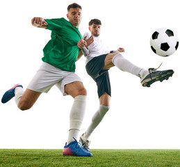 Athletes, soccer player in white stretches to defend against player in green's powerful kick on green lash playground against transparent background. Concept of sport, championship, match, movement.