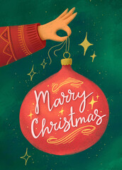 Illustration with hand hold christmas ball with Hand-drawn lettering Merry Christmas on a green background. Festive template for your design.