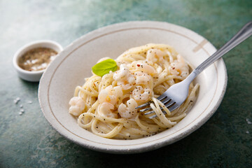 Pasta with cream sauce and shrimps