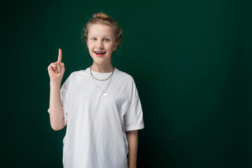 Woman in White T-Shirt Pointing at Camera