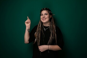 Woman With Dreadlocks Pointing at Something