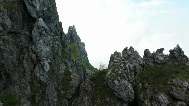 Lombardy, Italy - A Breathtaking Vista of the Rugged, Jagged Summit of Grignetta - Drone Flying Forward
