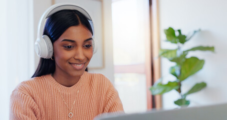 Indian woman, remote work and laptop with headphones for listening, hearing and editing online audio. Freelancer, female person or video editor with digital for creative process, sound and satisfied
