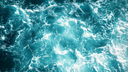 A Close-Up View of Ocean Water with White Foam and Bubbles, Creating a Textured and Abstract Background