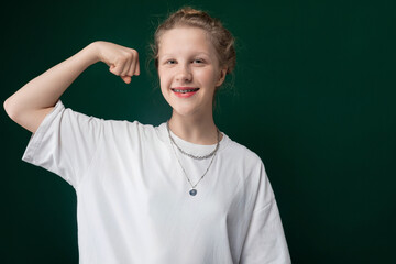 Woman Posing for Picture With Green Background