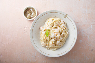 Pasta with cream sauce and shrimps