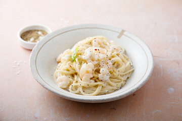 Pasta with cream sauce and shrimps