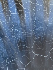 Abstract burn pattern from dustbin lid