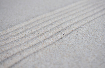 lines formation on beach sand with customizable space for text