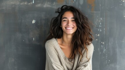 Obraz premium Smiling Woman in a Sweater - Portrait of Happiness