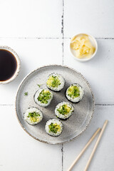 Vegan sushi rolls with avocado and cucumber
