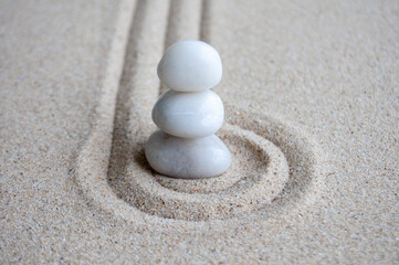 White Zen stones on circles formation with customizable space for text