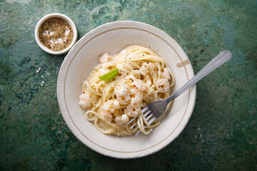 Pasta with cream sauce and shrimps