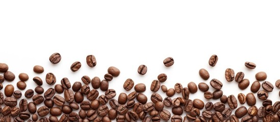A coffee beans border isolated on a white background with a copy space image from a top view