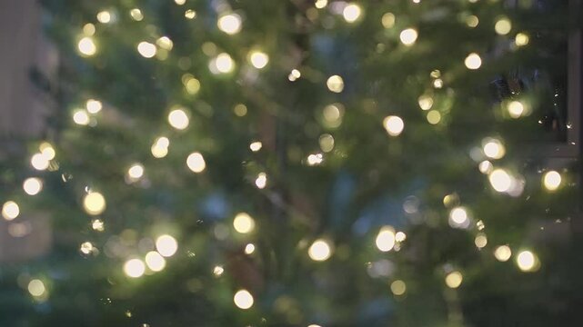 Blurry Christmas lights out of focus background. 4K