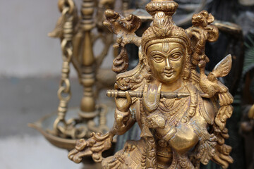 Bronze statue of Lord Krishna with flute.