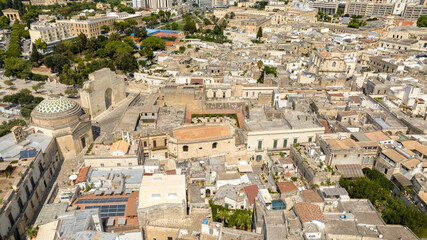 Aerial view of Porta Napoli and the San Luigi Gonzaga church. It is one of the entrances to the historic center of Lecce, Puglia, Italy.