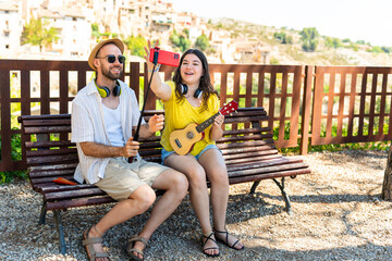 Couple enjoying the Spanish summer with music and party