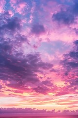 Colorful sunset sky with dramatic pink, purple, and blue clouds, creating a serene and picturesque evening atmosphere.