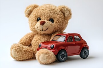 a teddy bear and a toy car

