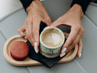 person holding a cup of coffee
