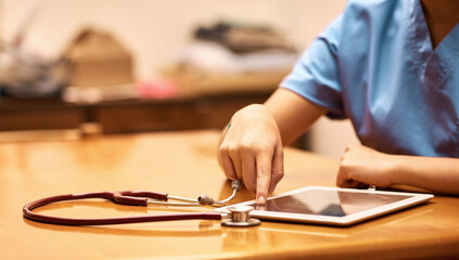 Hands, woman and doctor with tablet, typing and internet with online schedule, connection and telehealth. Closeup, medical or professional with social media, communication or network with digital app