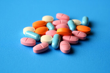 pharmaceuticals antibiotics pills medicine /colorful antibacterials pills on white background /capsule pill medicine, Medicine. Pharmacy theme. Multicolored Isolated Pills and Capsules on the White S
