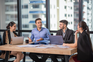 Portrait of businesspeople meeting to be discussing business plan