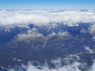 Obraz premium Snow covered mountain top in Austria. View of the Alps from the Zugspitze, the highest mountain in Germany