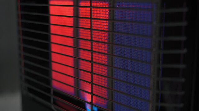 Close-up of a gas heater in the process of warming up to operating temperature