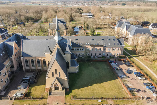 Aerial view of a historical church and adjacent buildings