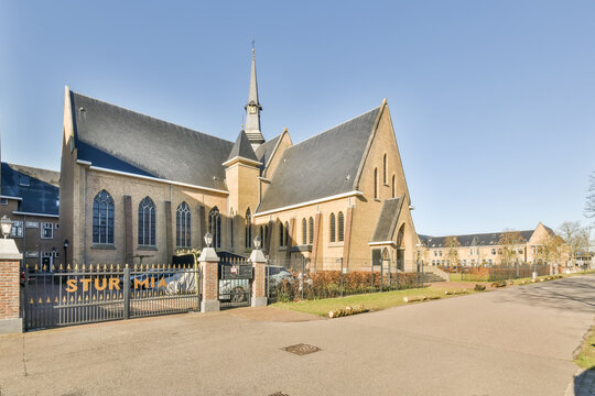 Historic church architecture under clear blue sky