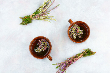Ceramic mug of dry healthy heather.