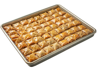 Large tray of baklava with crispy layers on transparent background