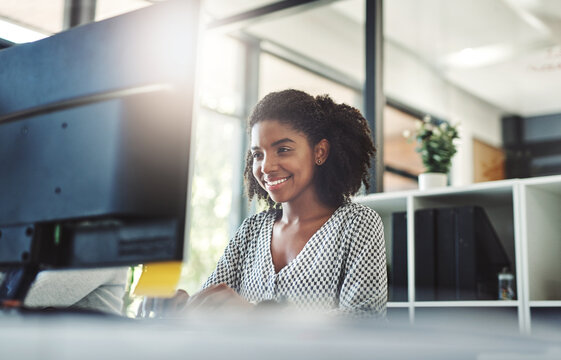 Business, black woman or typing on computer in office for blog post, research story or copywriting article. Advertising agency, writer or happy with feedback review on pc for creative project at desk